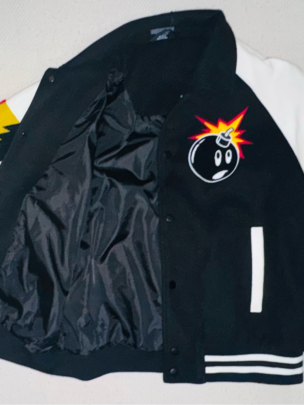 The Hundreds Black & White Varsity Bomber Jacket with Red Bomb Patch